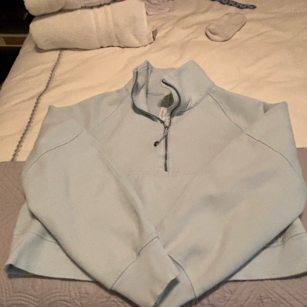 Lululemon Athletica Light Blue cropped sweatshirt.